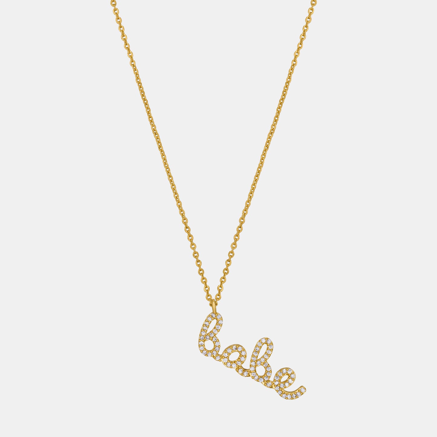 golden necklace with the word love on it