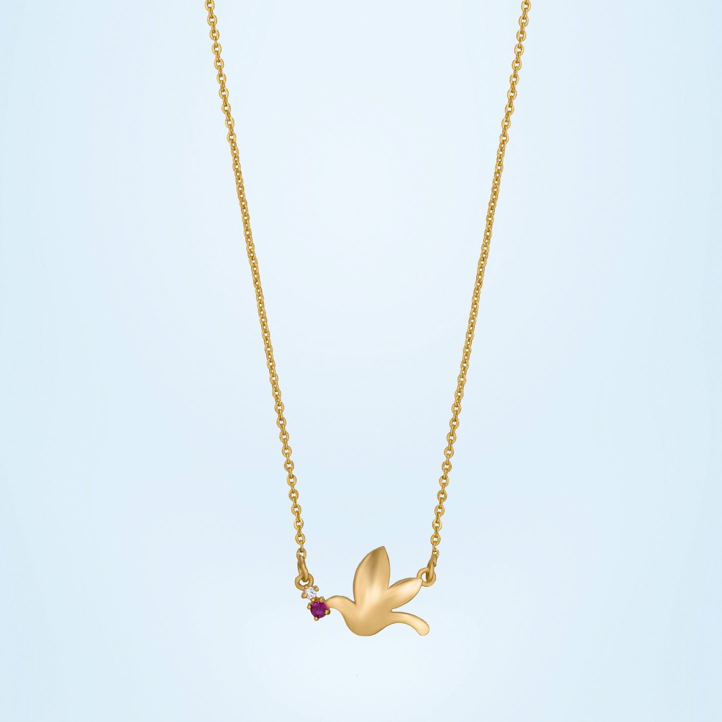 new heights with this enchanting golden bird necklace