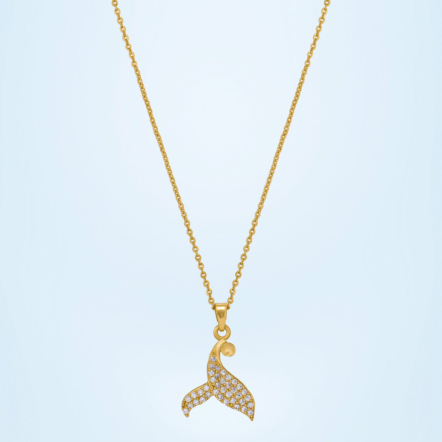 golden necklace with a diamond dolphin pendant