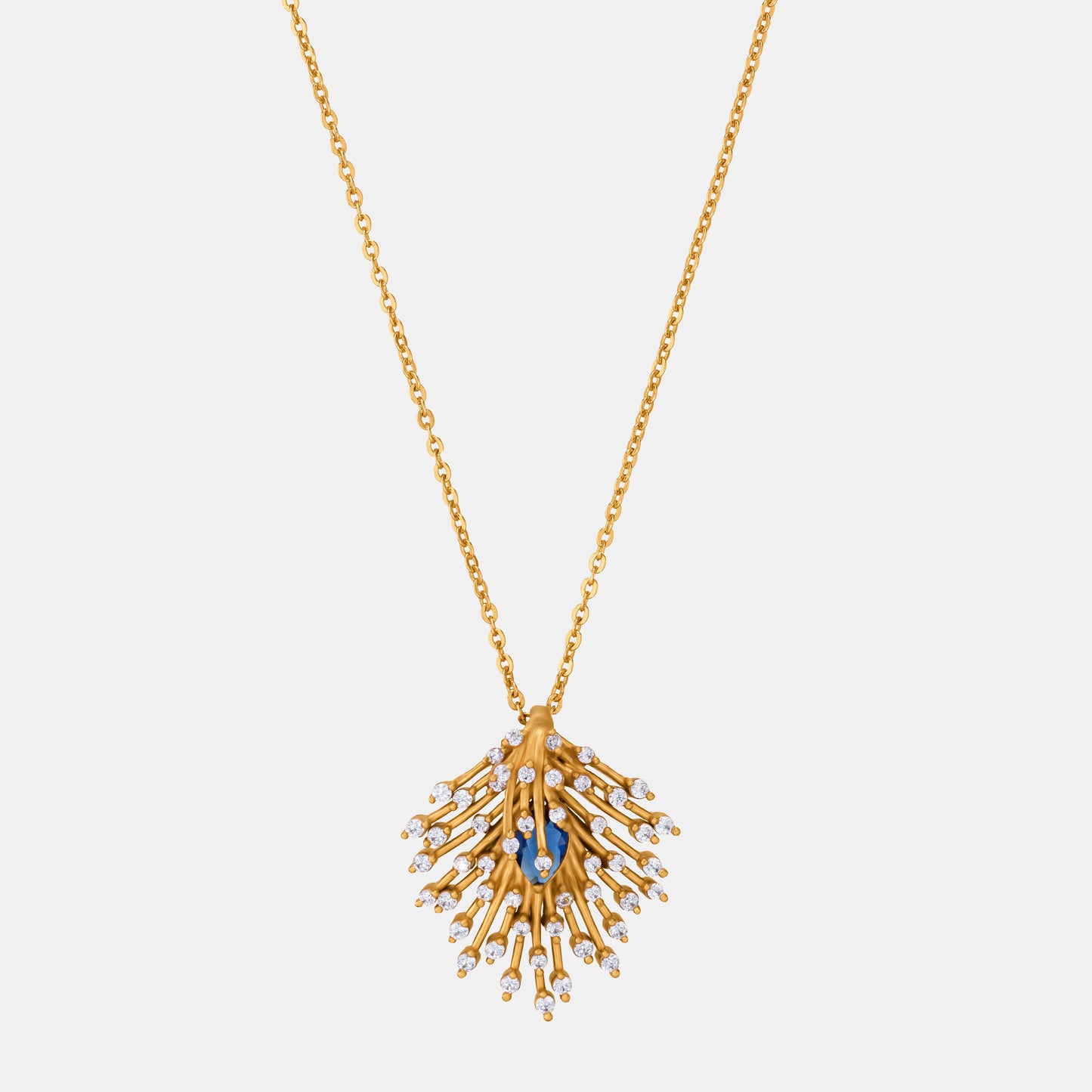 golden necklace with a blue stone pendant