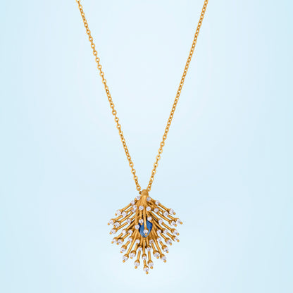 Golden Necklace with a Blue Stone Pendant