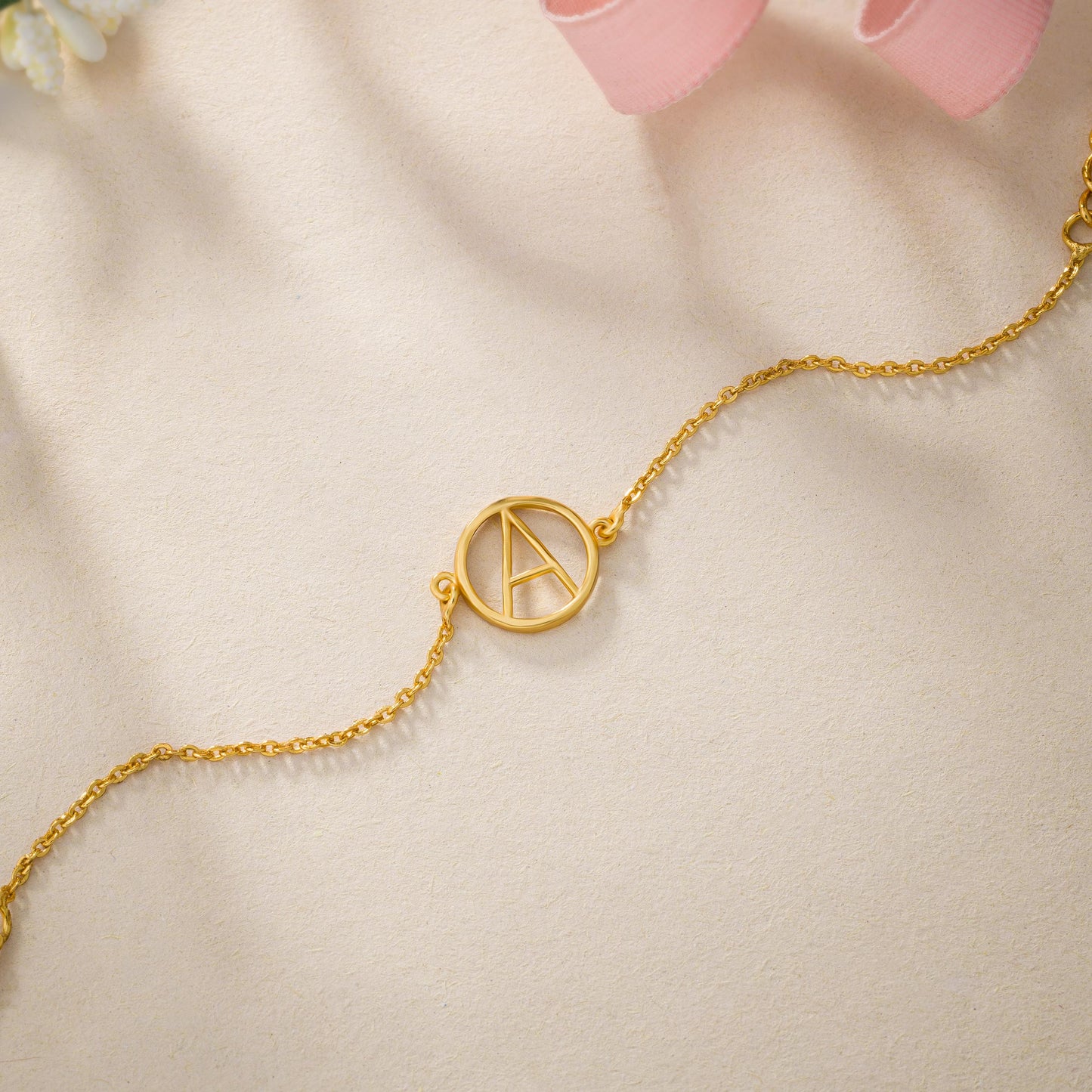 golden bracelet with letter a