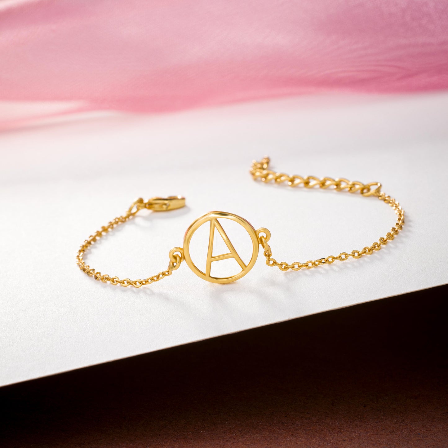 golden bracelet with letter a