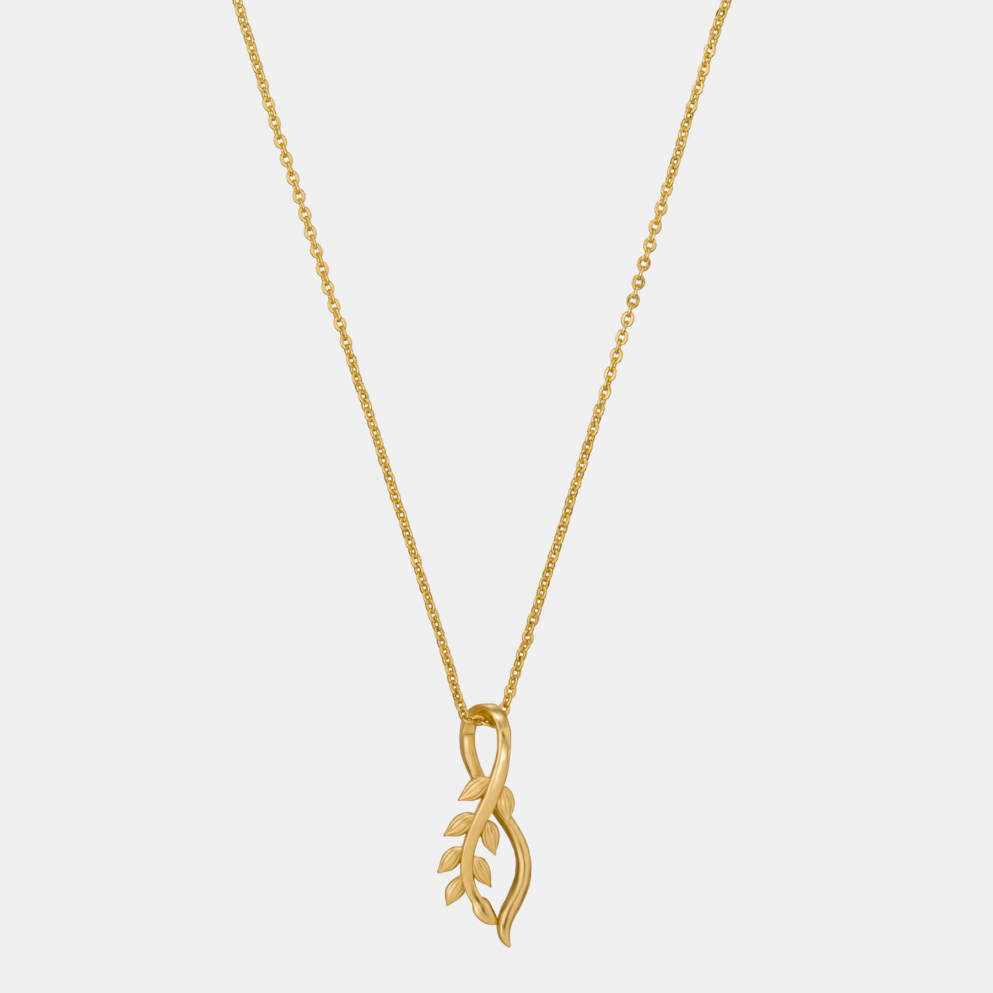 golden necklace with a small leaf on it