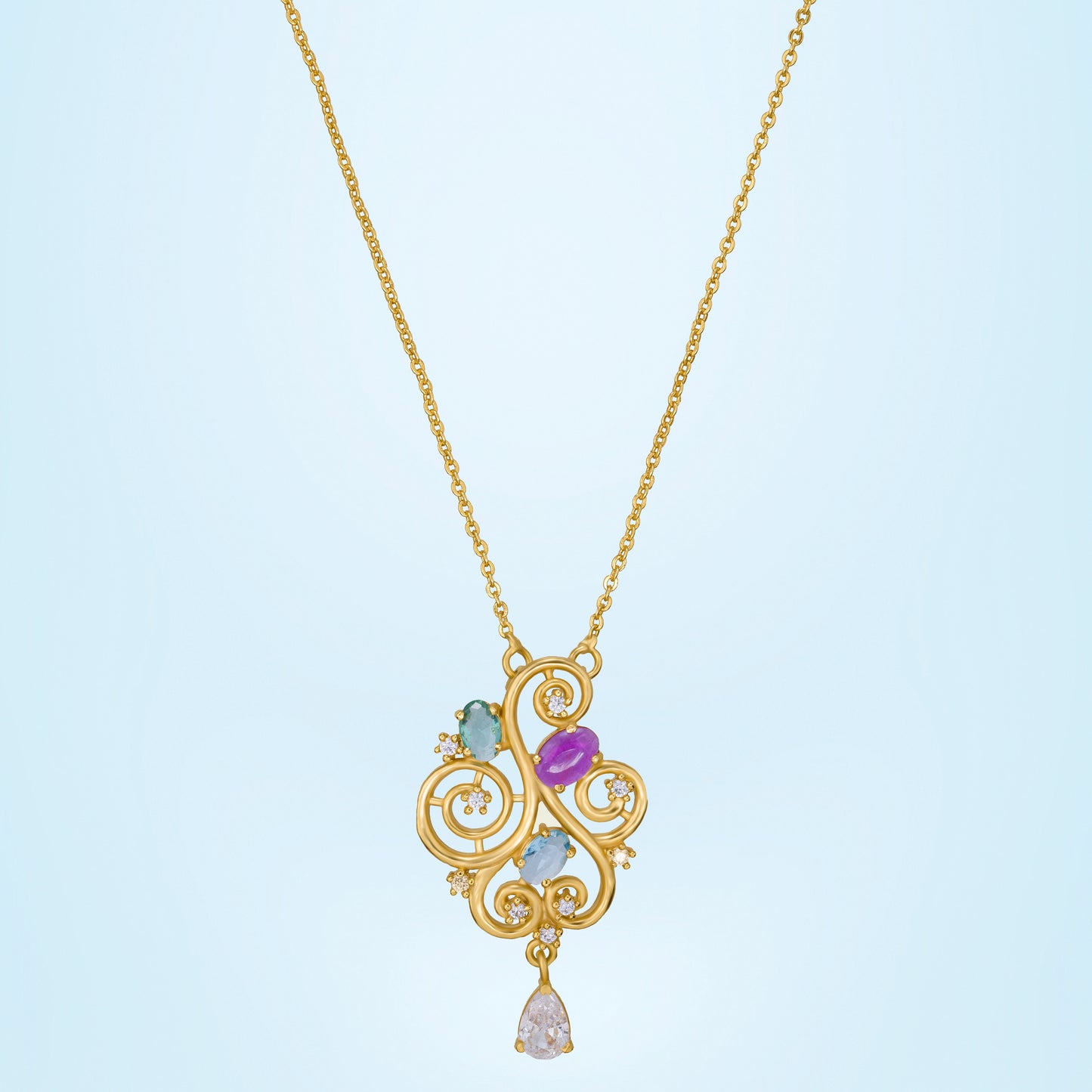 golden necklace with a purple stone and a white diamond