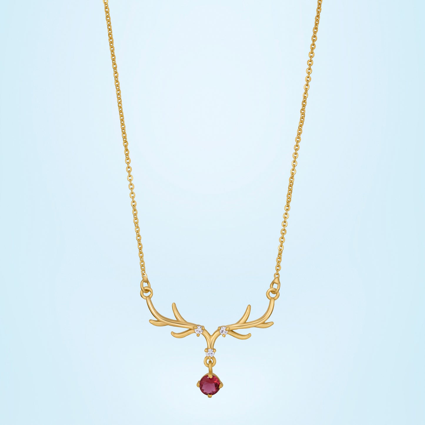 the golden deer necklace with a stone