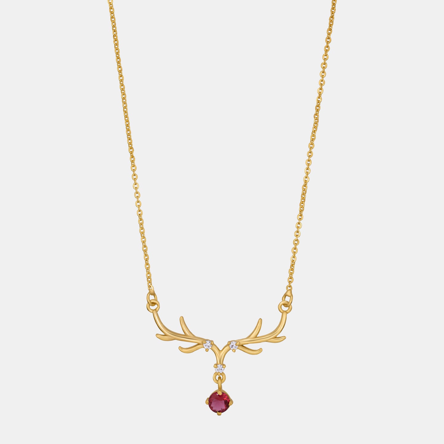 the golden deer necklace with a stone