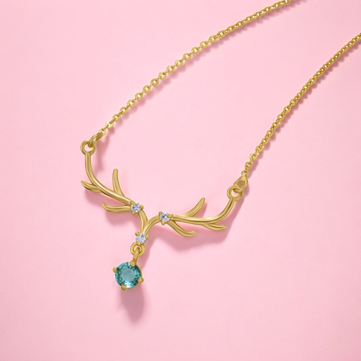 the golden deer necklace with a stone