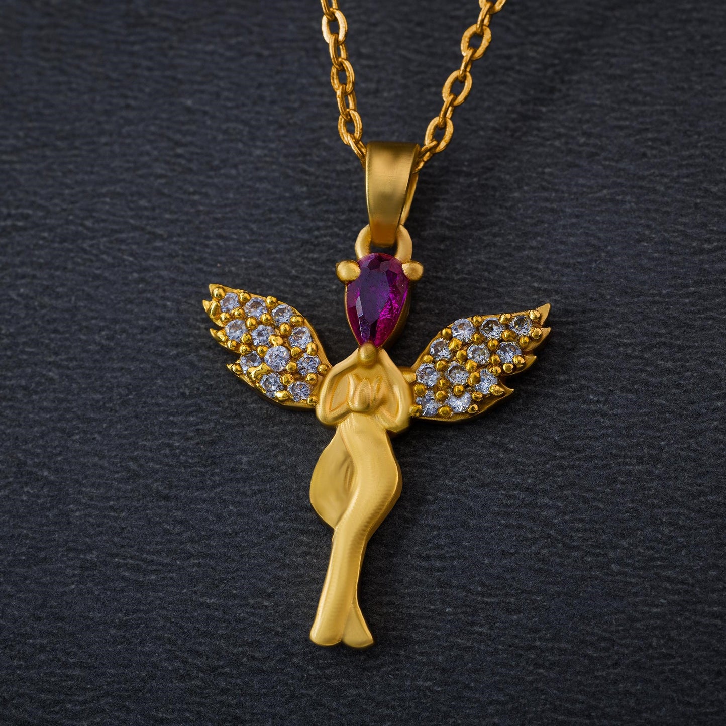 golden necklace with a purple stone angel