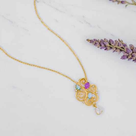 Golden Necklace with a Purple Stone and a White Diamond