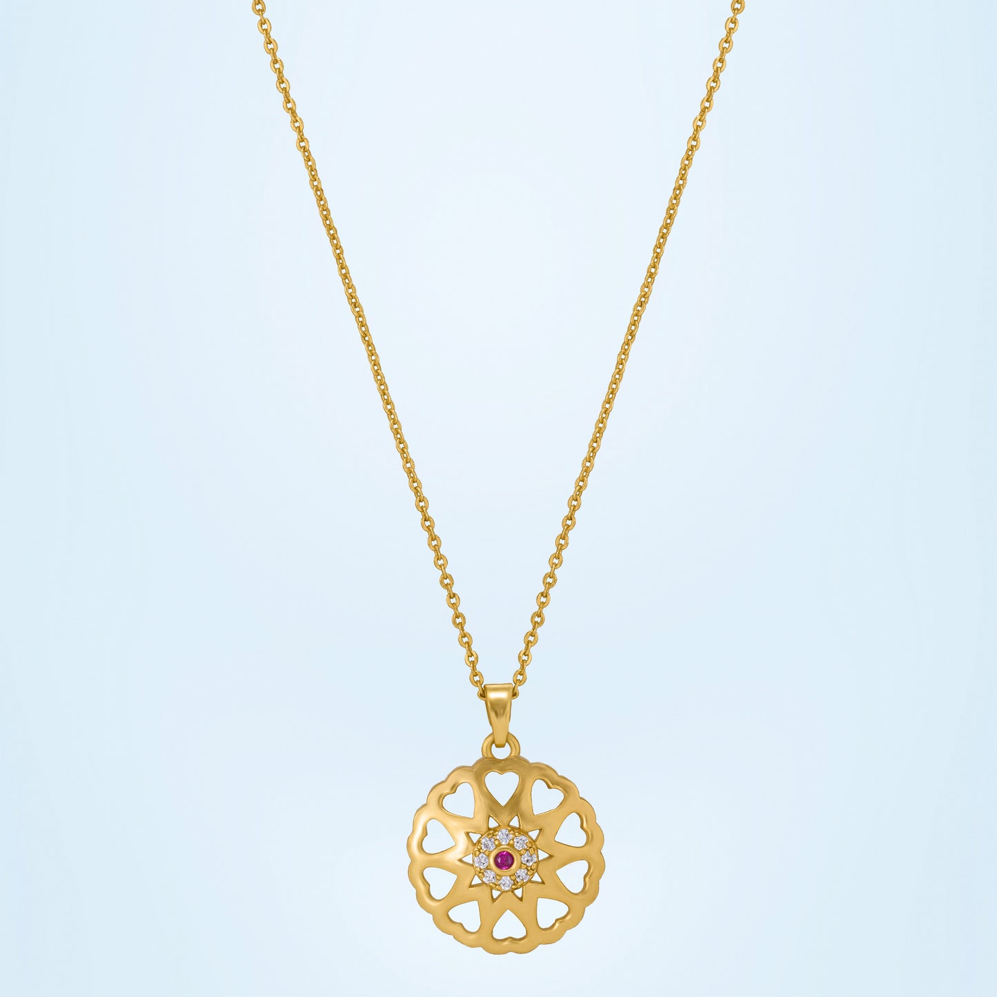 golden necklace with a flower design on it