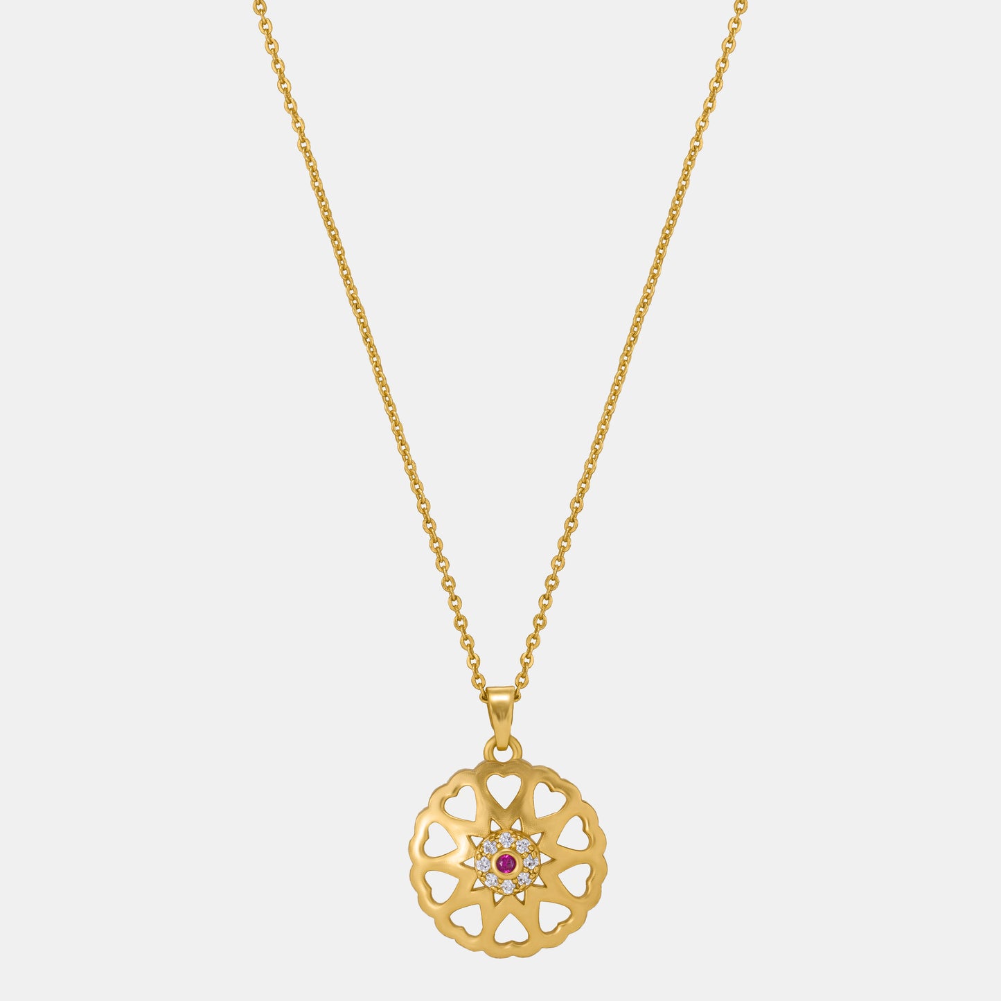 golden necklace with a flower design on it