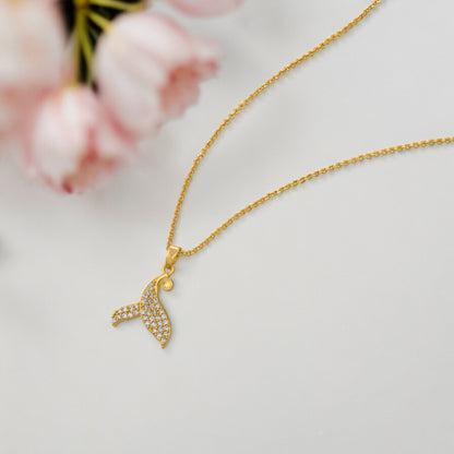 Golden Necklace with a Diamond Dolphin Pendant