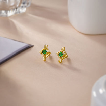 Pair of Golden Earrings with a Diamond