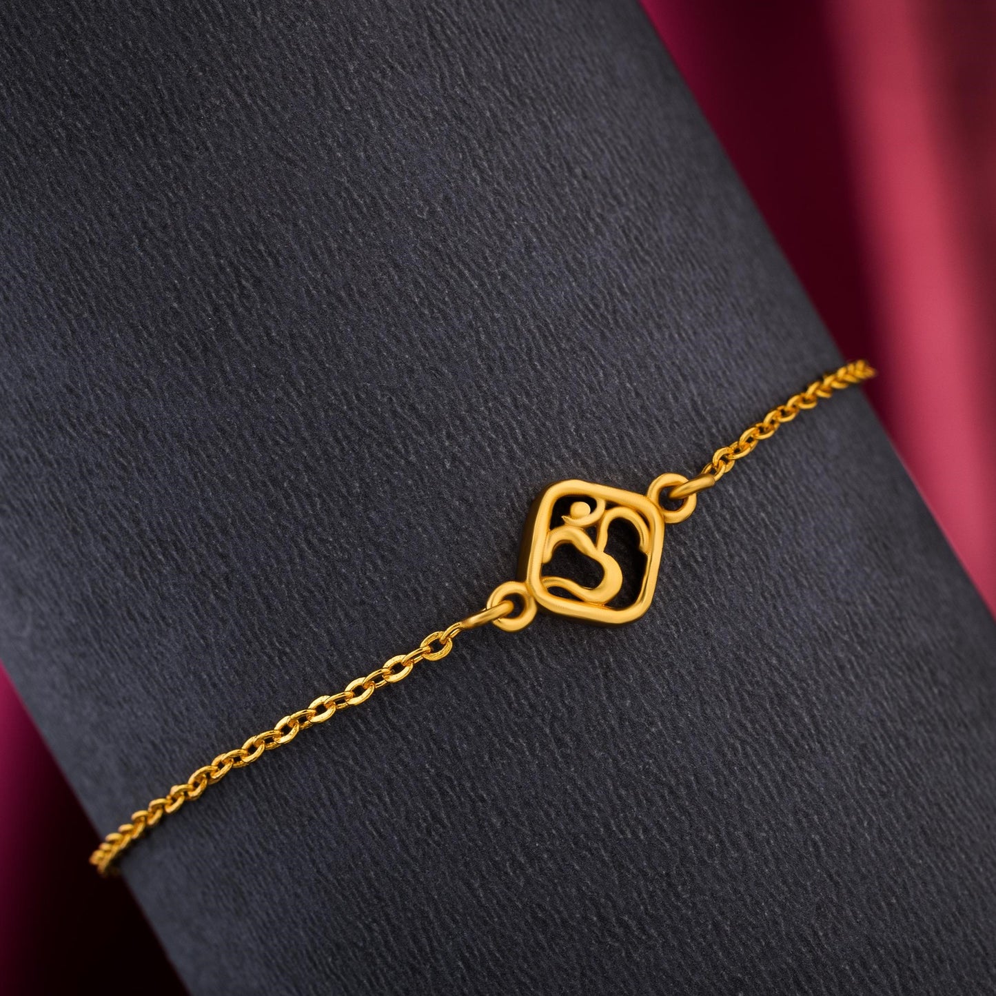 golden bracelet with a om