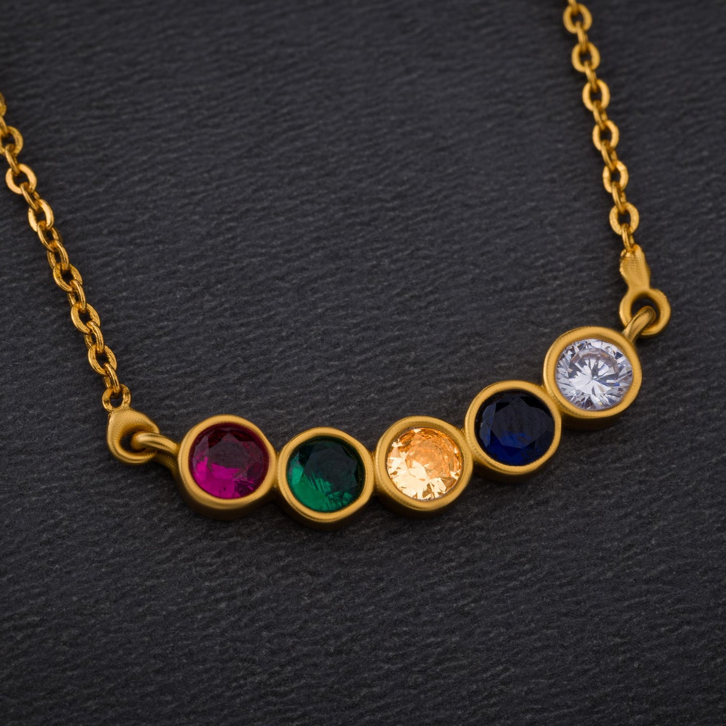 golden necklace with multicolor stones