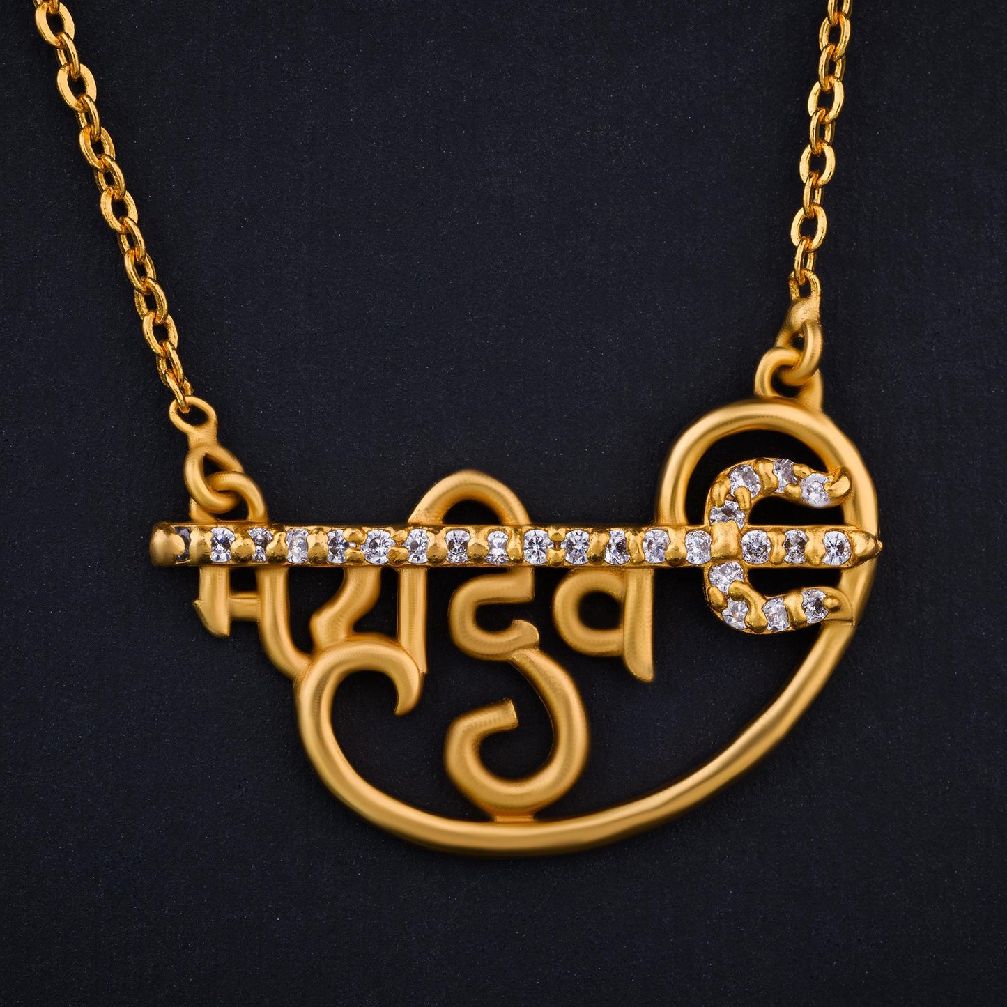 golden necklace with the mahadev