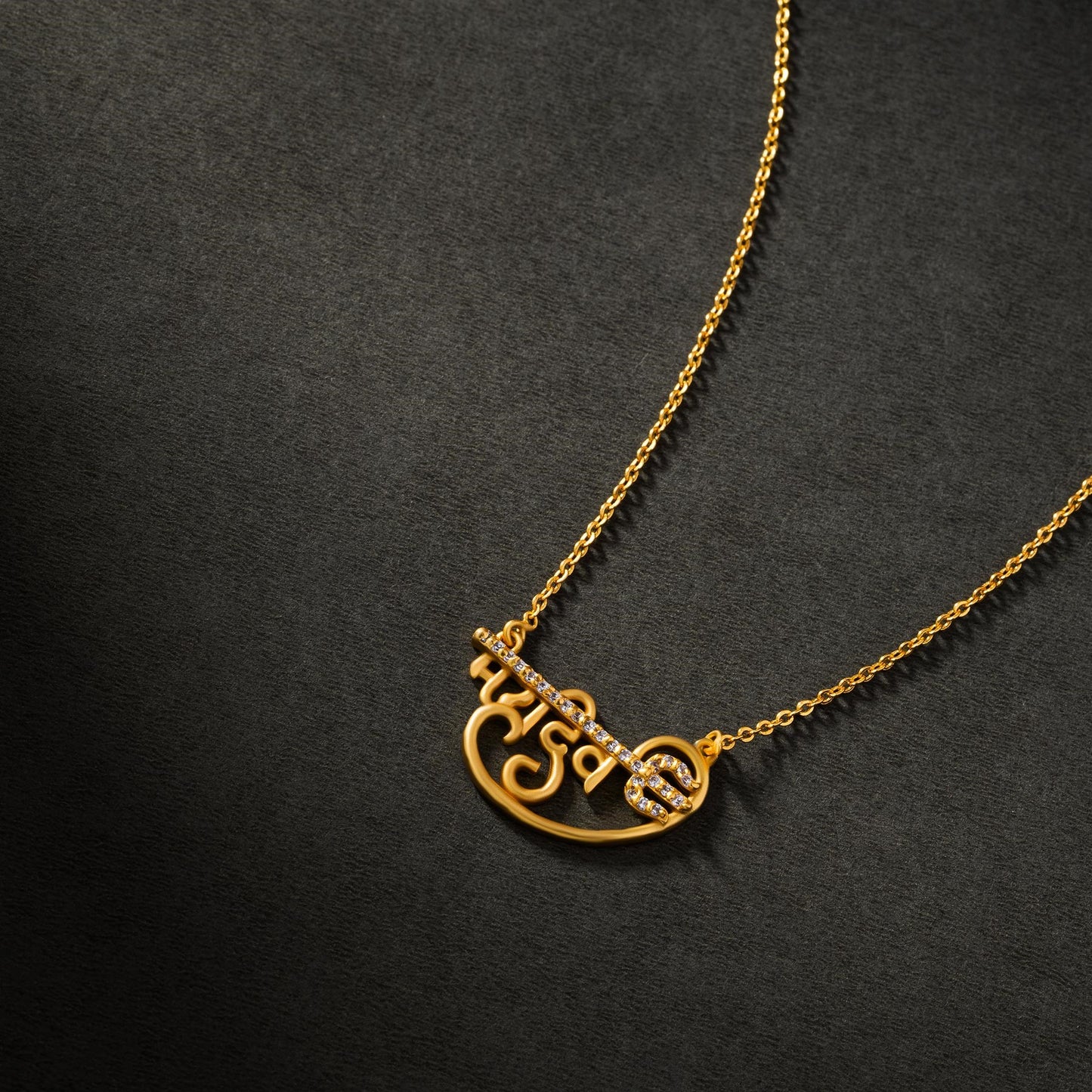 golden necklace with the mahadev