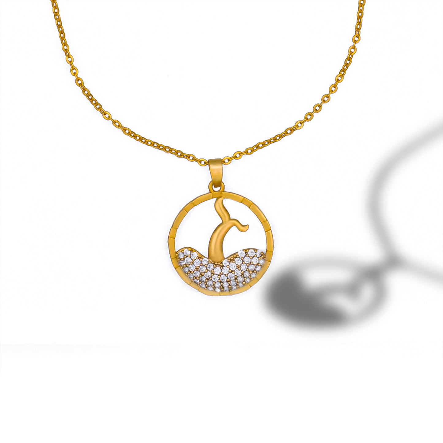 golden necklace with a diamond pendant