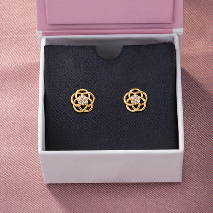 Golden Earrings with Intricate Flower