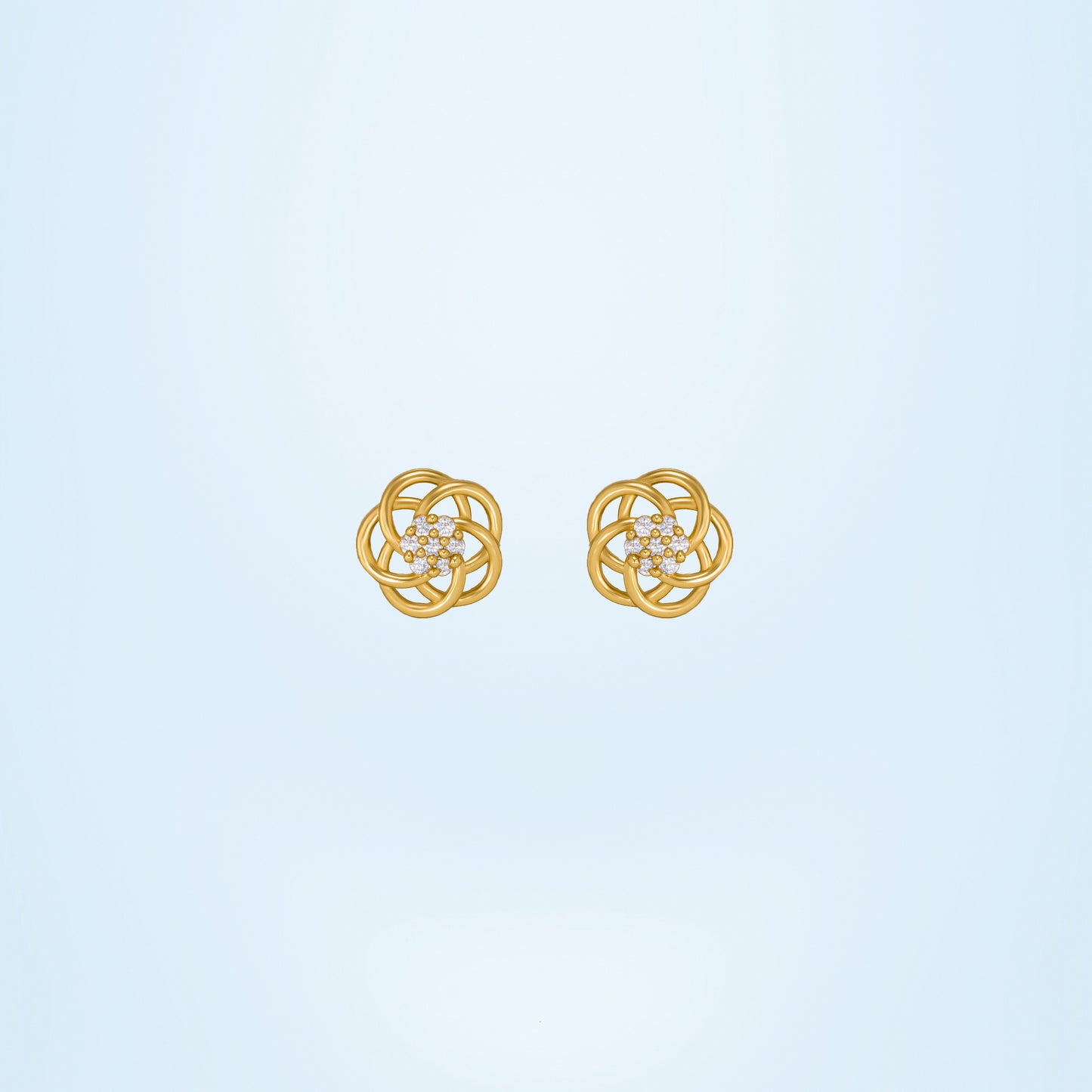 golden earrings with intricate flower