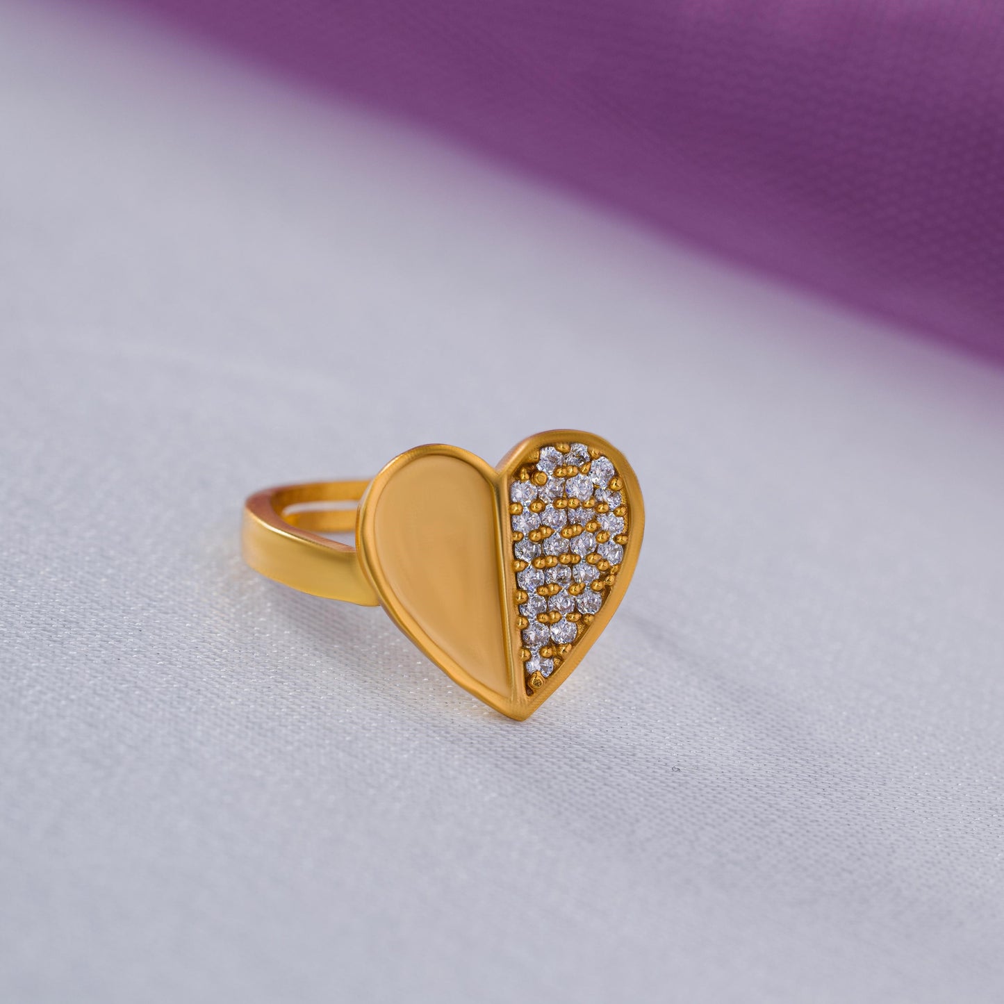 golden ring with a heart diamonds