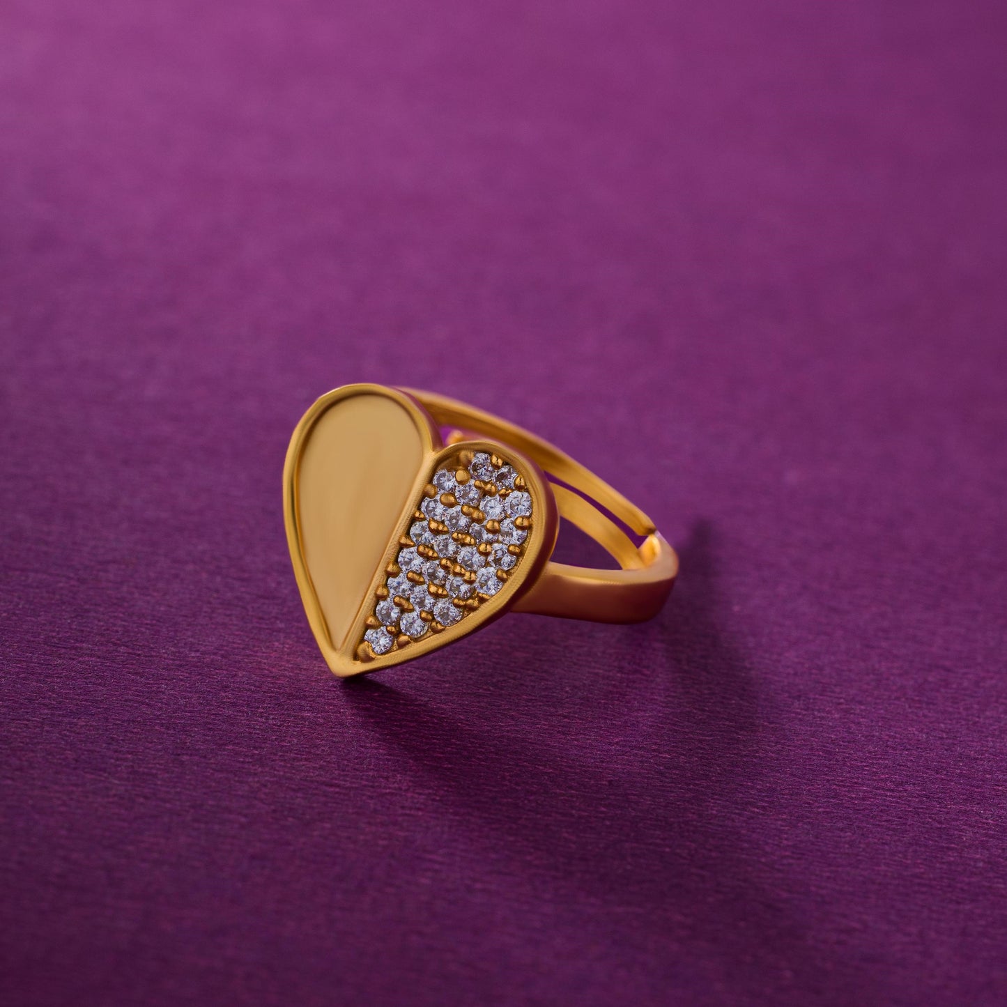 golden ring with a heart diamonds