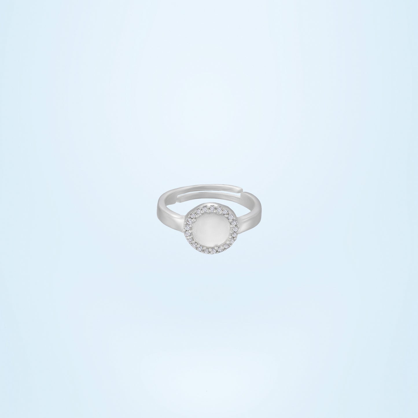 silver ring with a diamond and a small round stone