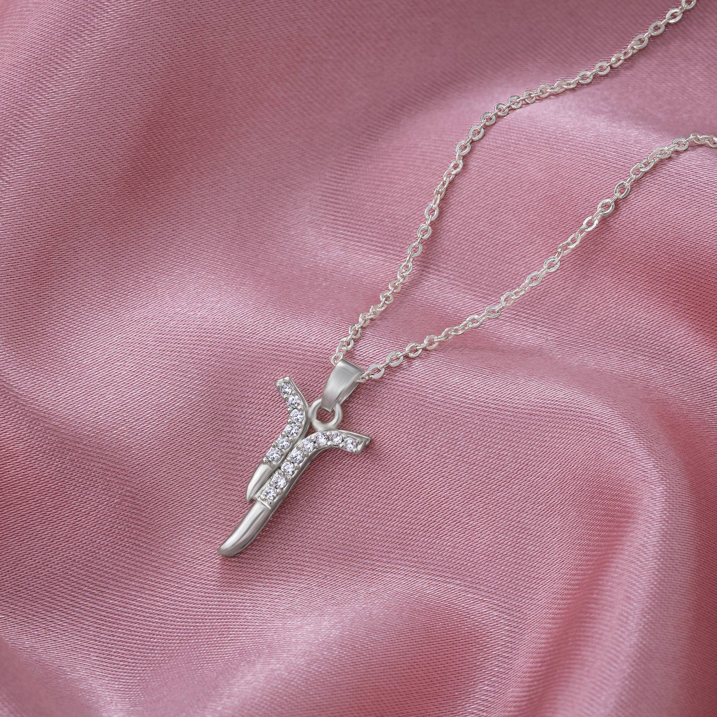 silver necklace with a diamond pendant