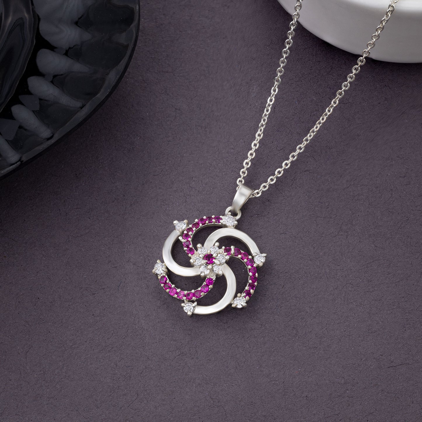 silver necklace with a diamond pendant