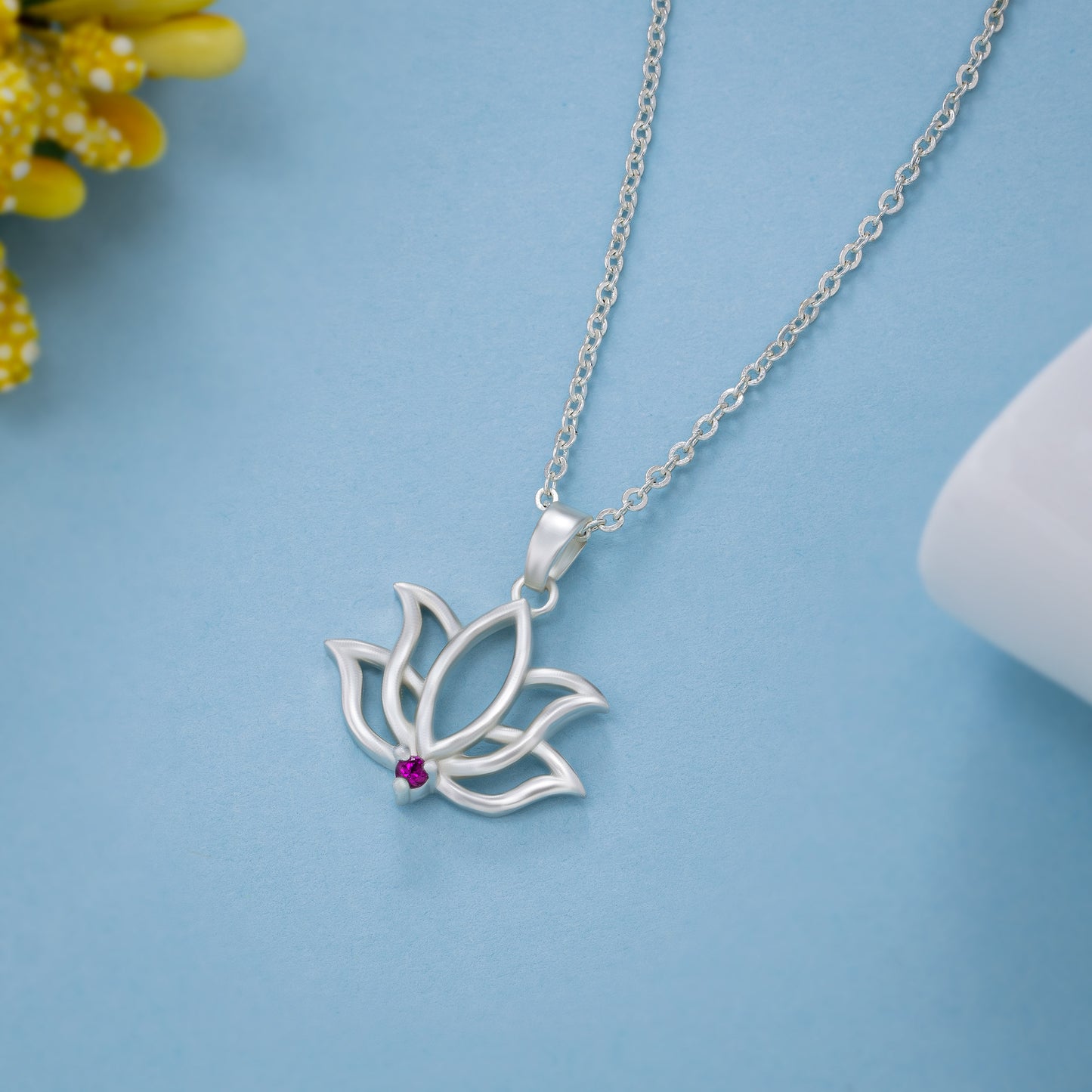 silver necklace with a lotus flower