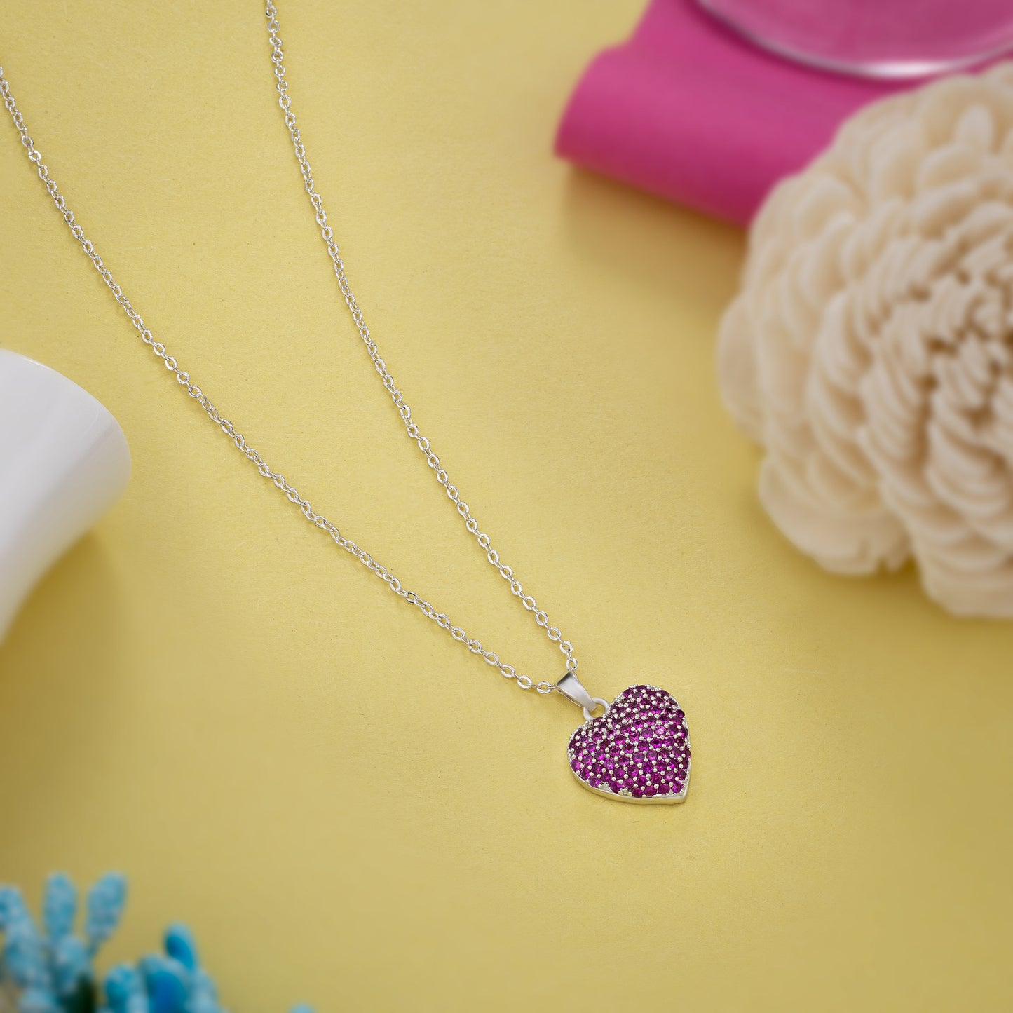 silver necklace with a heart pendant