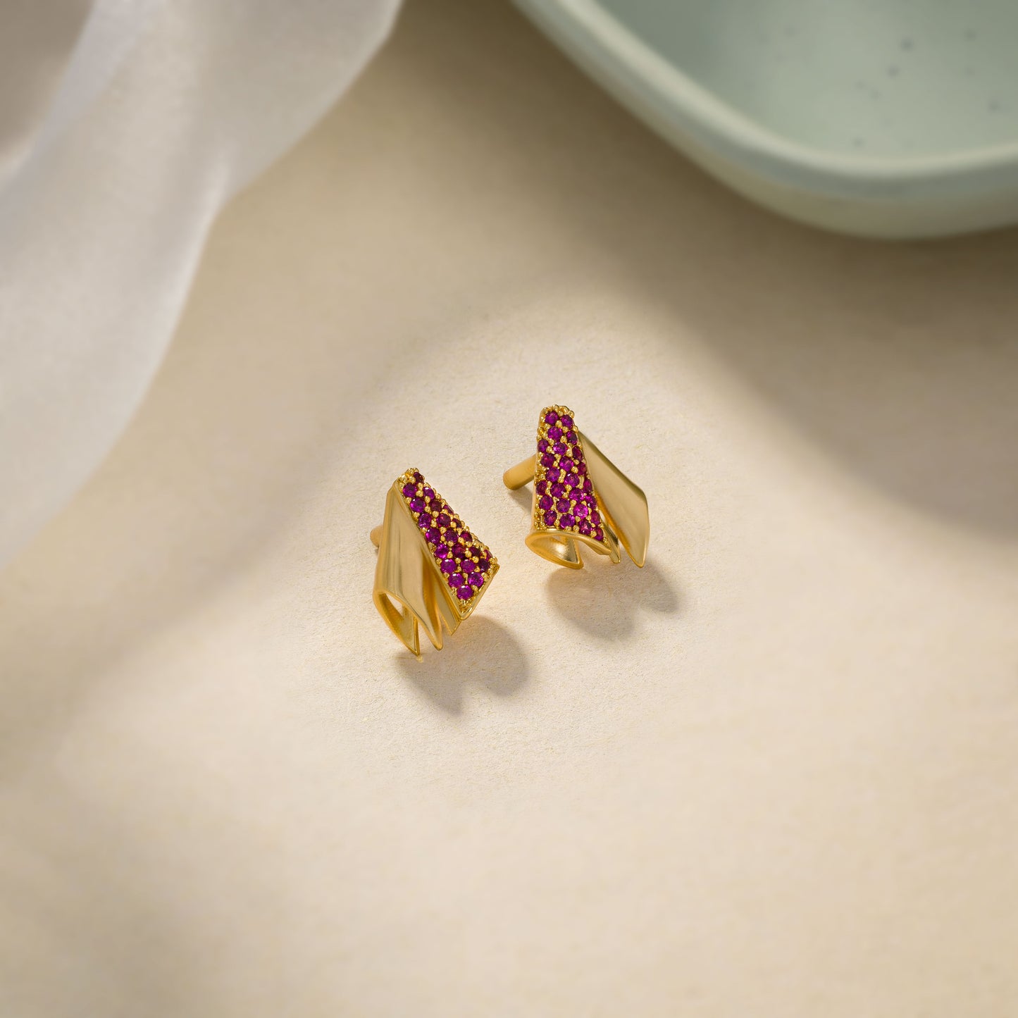 red wave sapphire studs