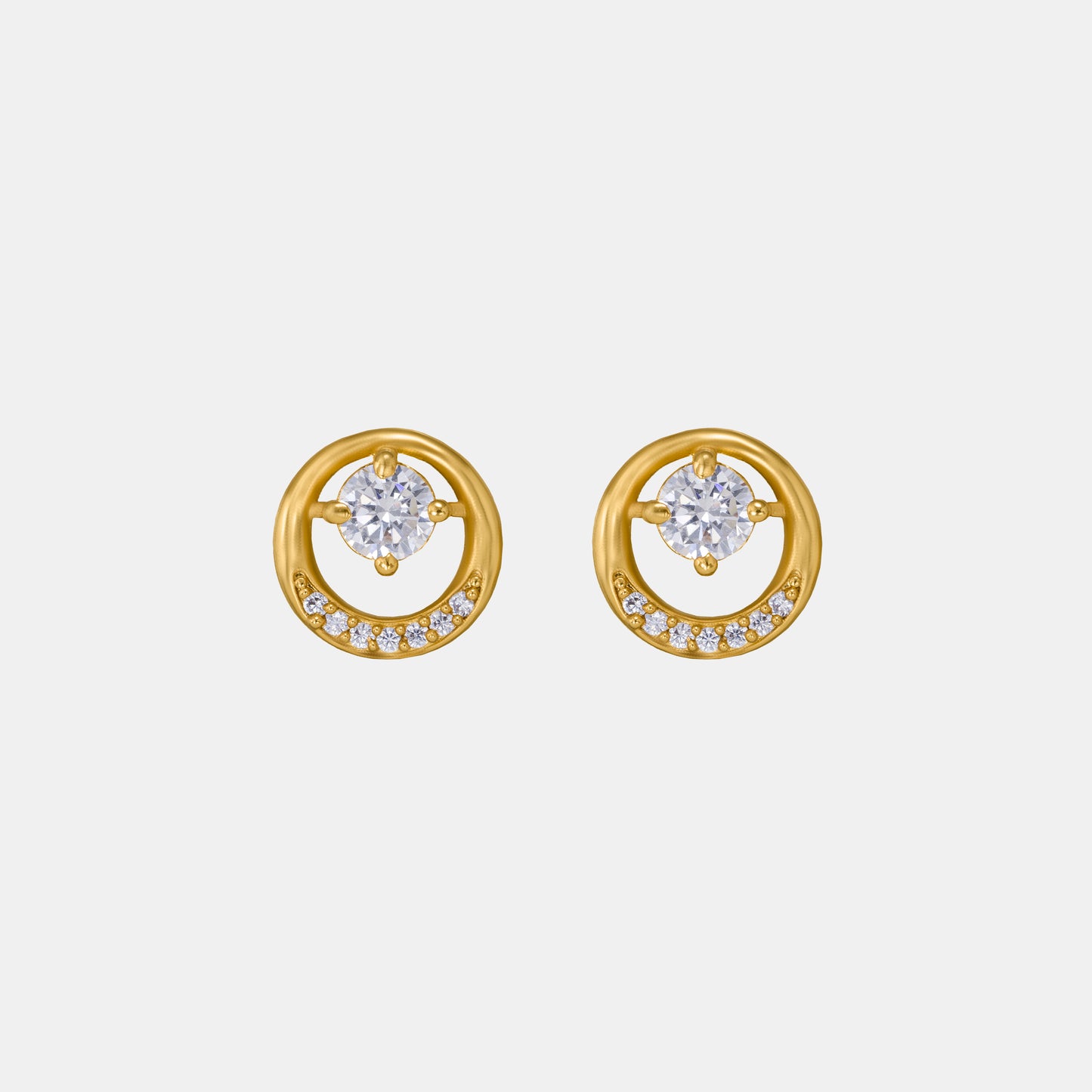 pair of golden plated earrings with sparkling stones