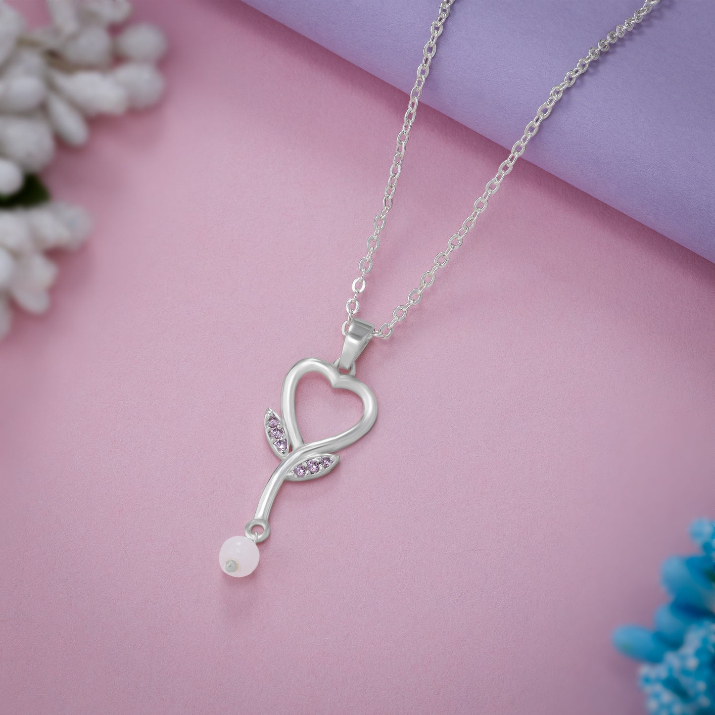 silver necklace with a diamond heart pendants