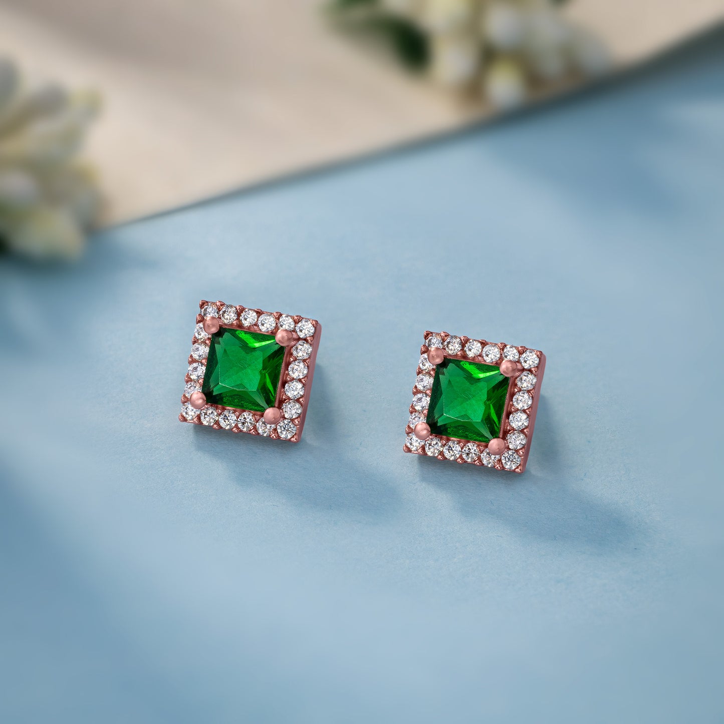 exquisite emerald and diamond stud earrings