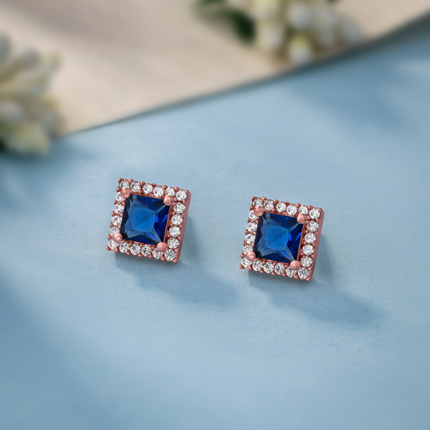 exquisite emerald and diamond stud earrings