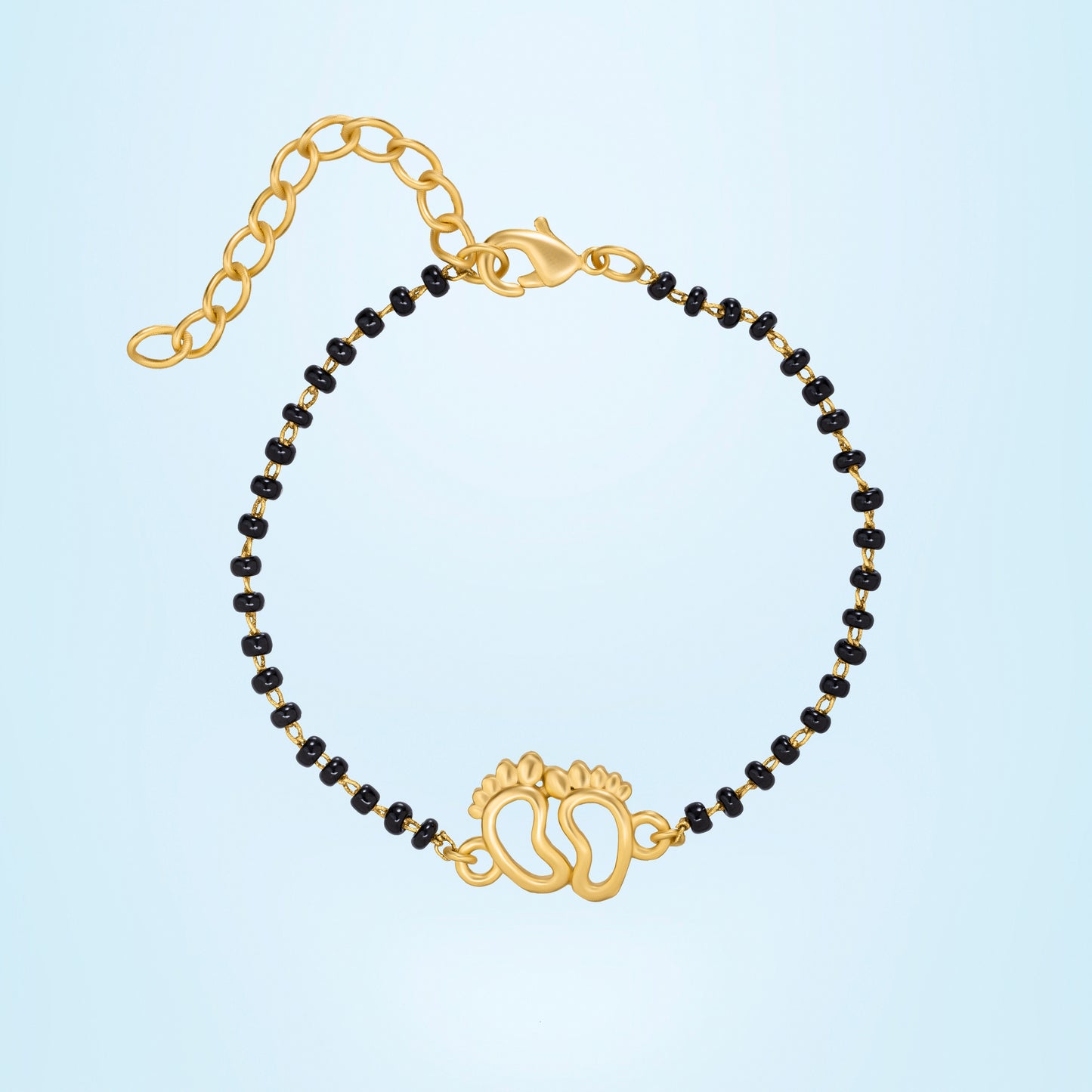 bracelet with a golden and black bea