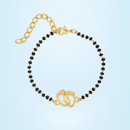 Bracelet with a Golden and Black Bea