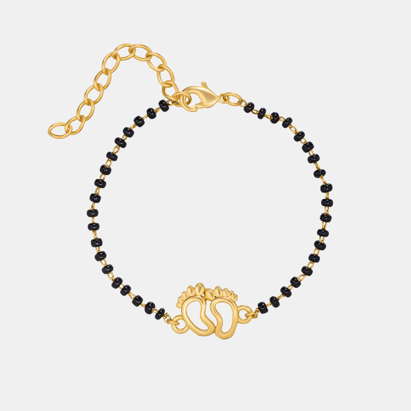 bracelet with a golden and black bea