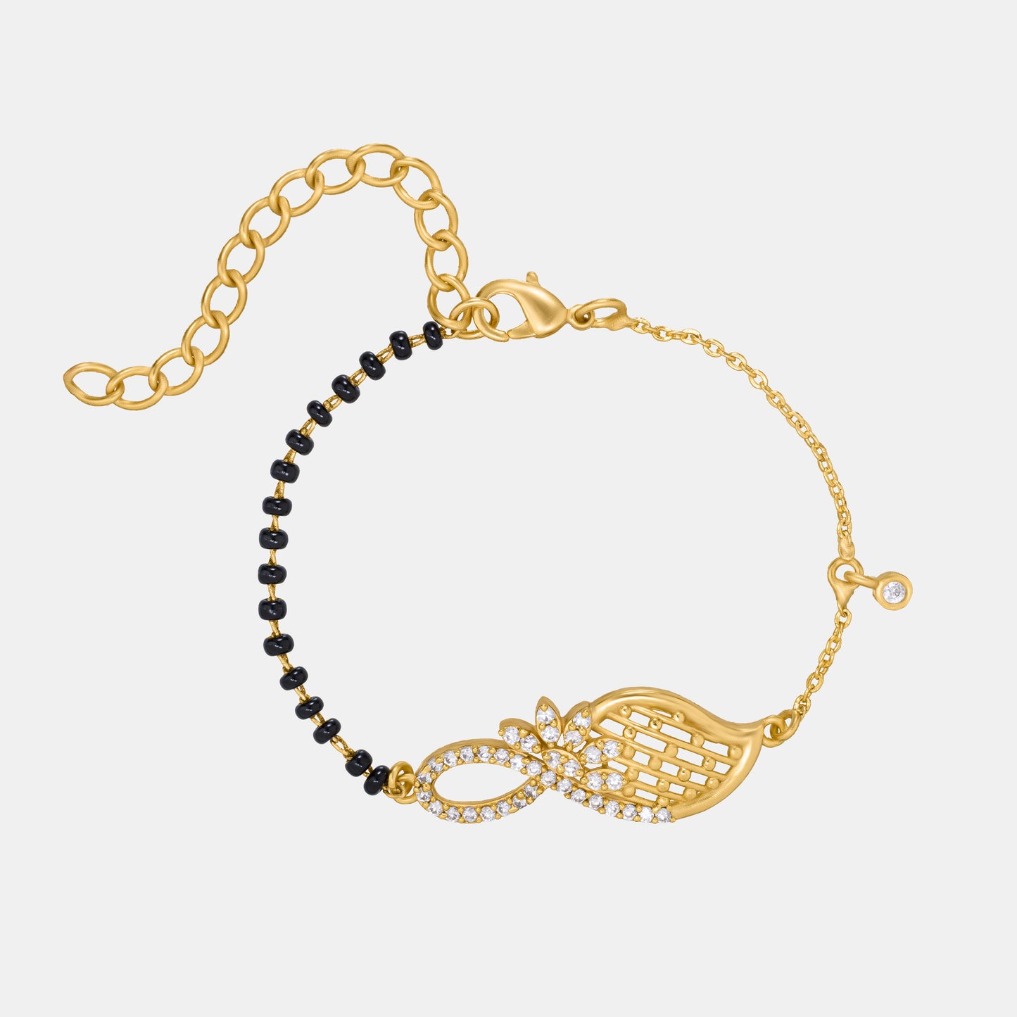 golden bracelet with black beads