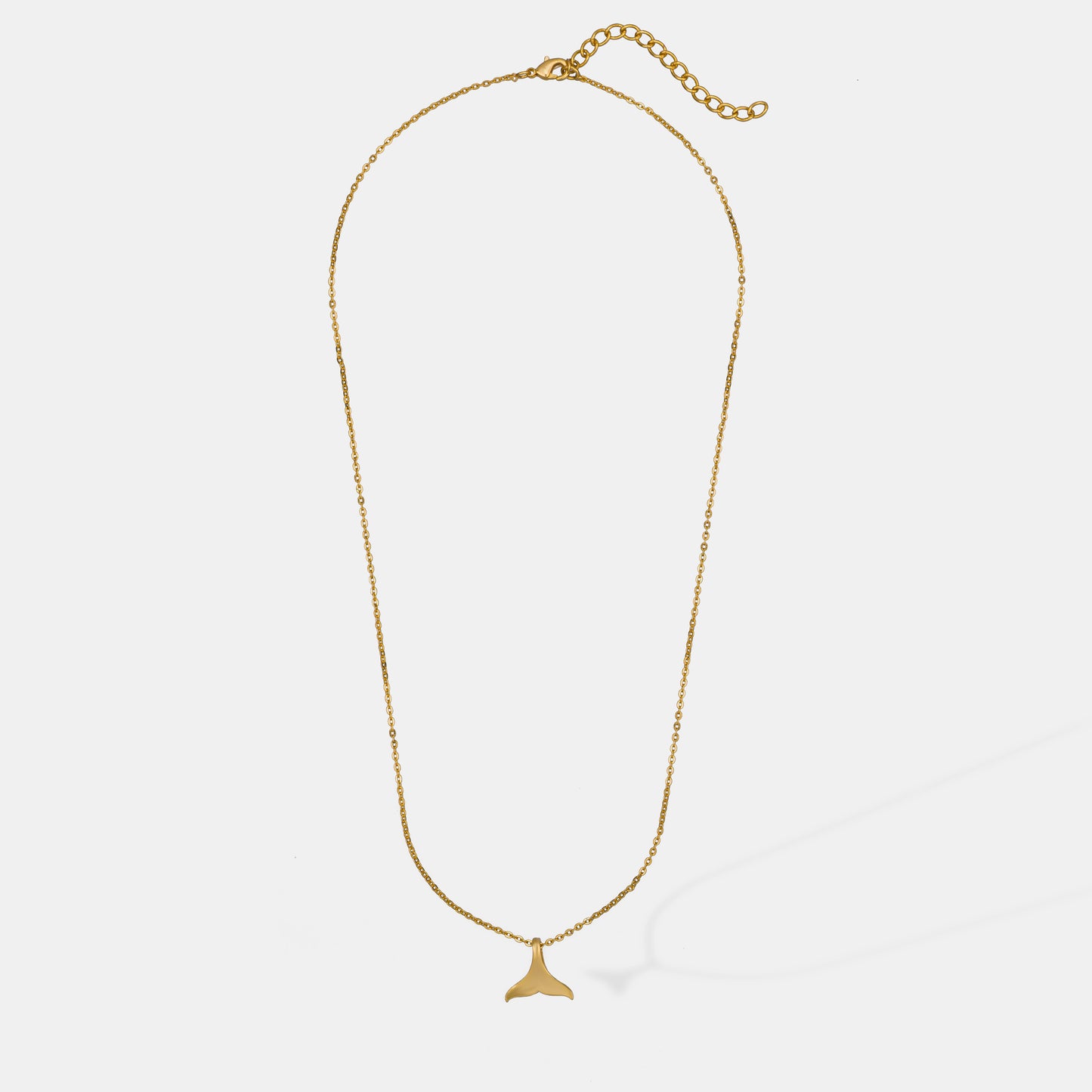 golden necklace with a small sting