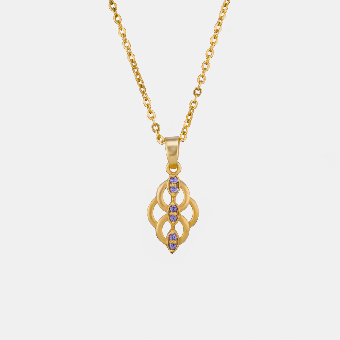 golden necklace with a purple stone