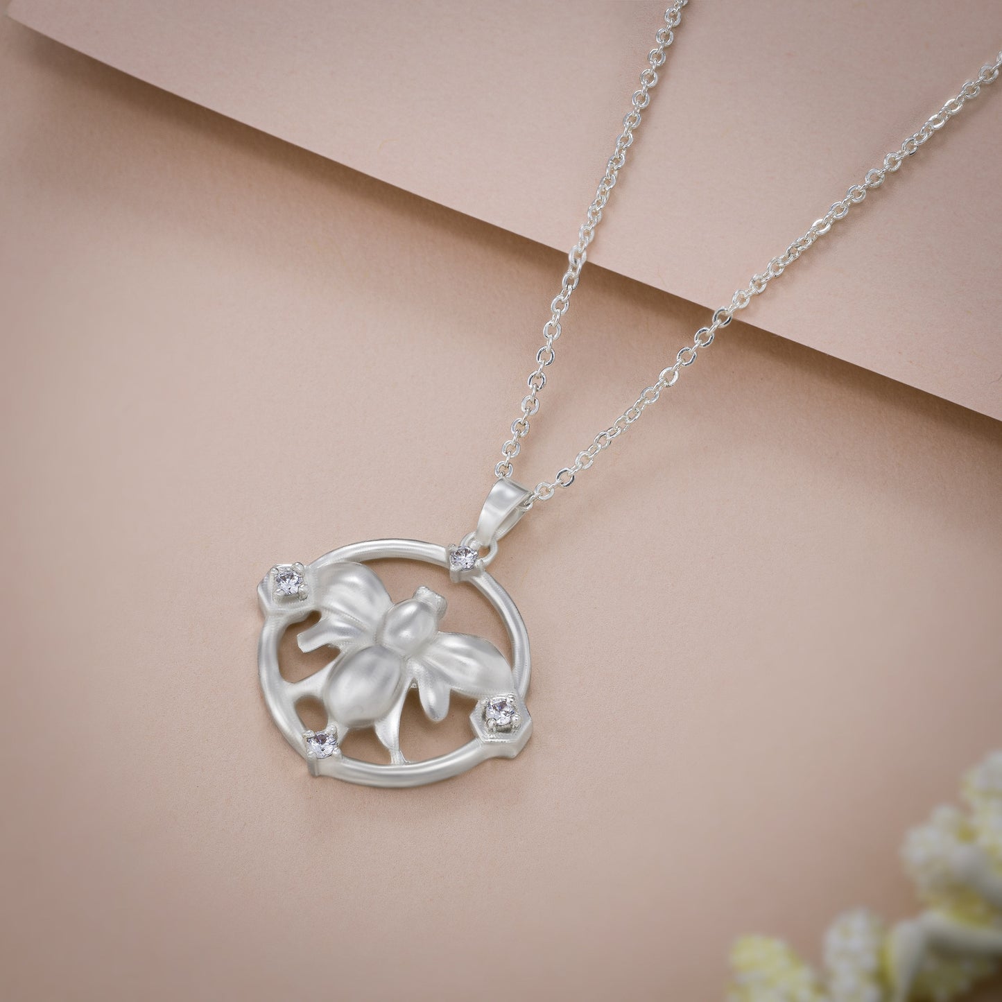 silver necklace with a turtle on it