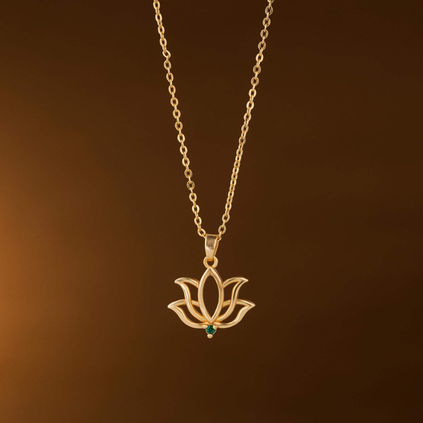 golden necklace with a lotus flower