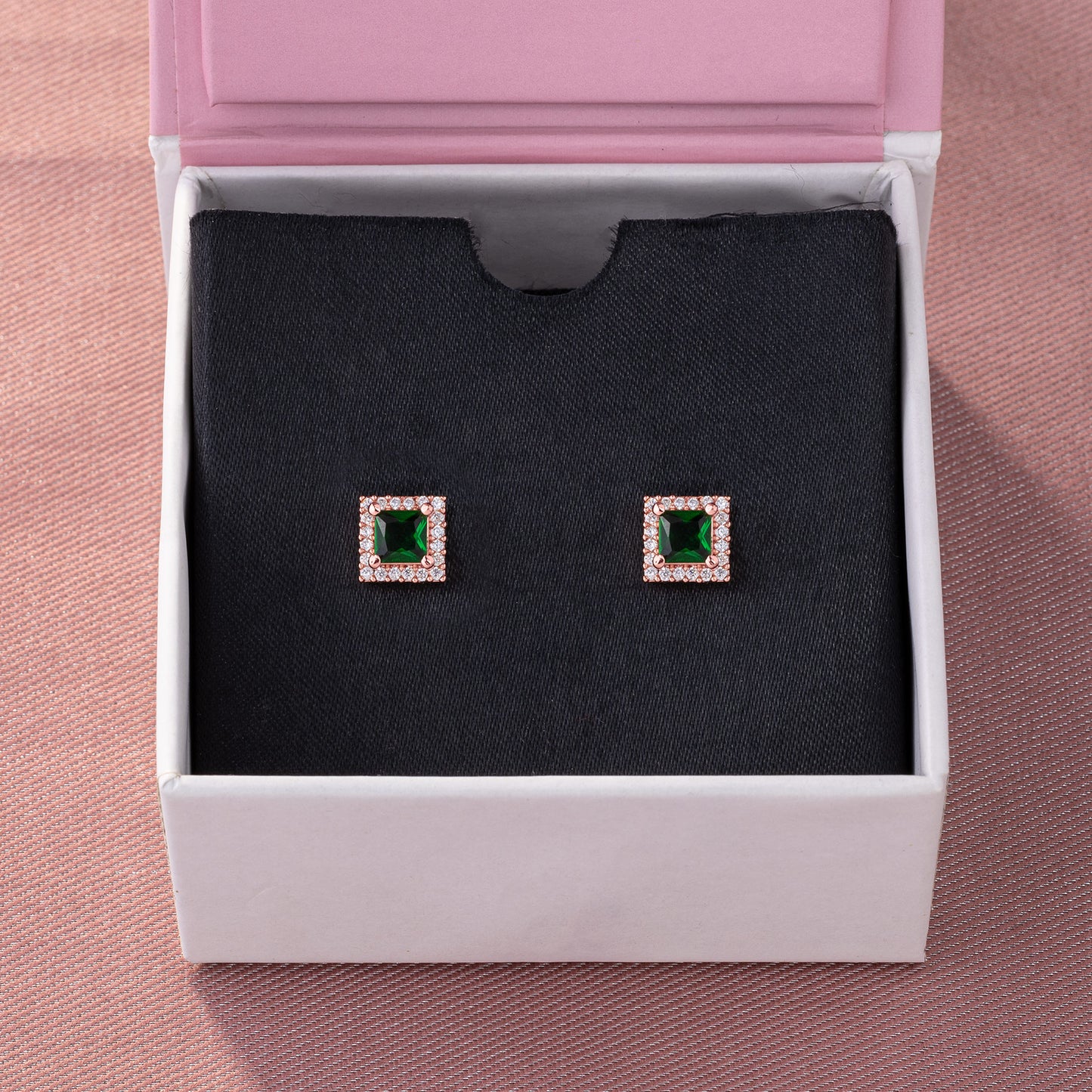 exquisite emerald and diamond stud earrings