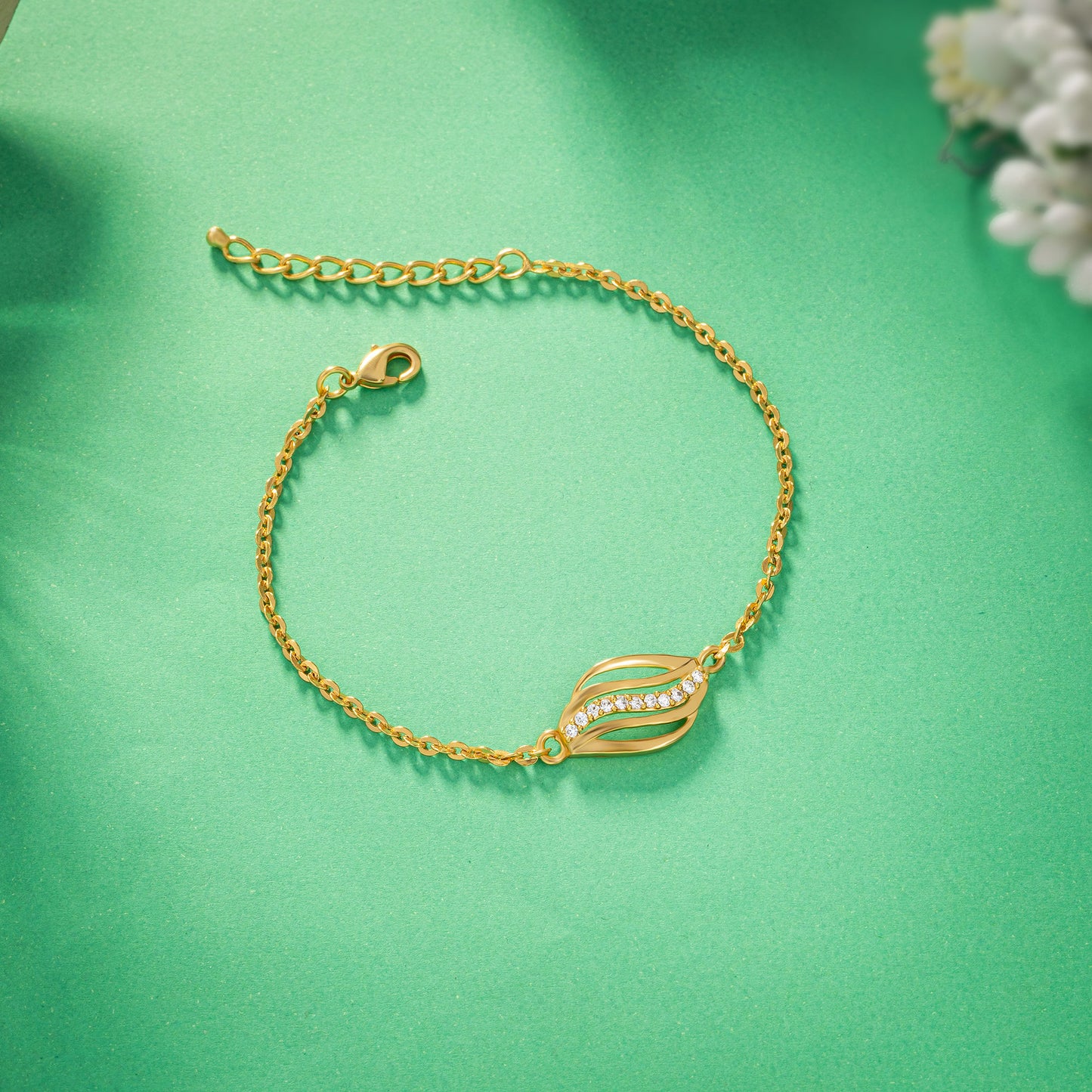 golden bracelet with a diamond accent