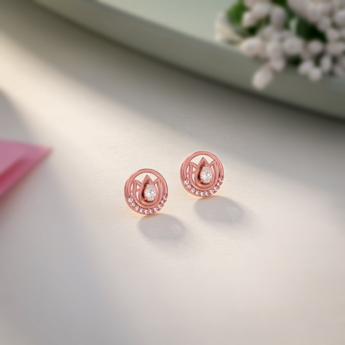 the rose gold earrings with stones