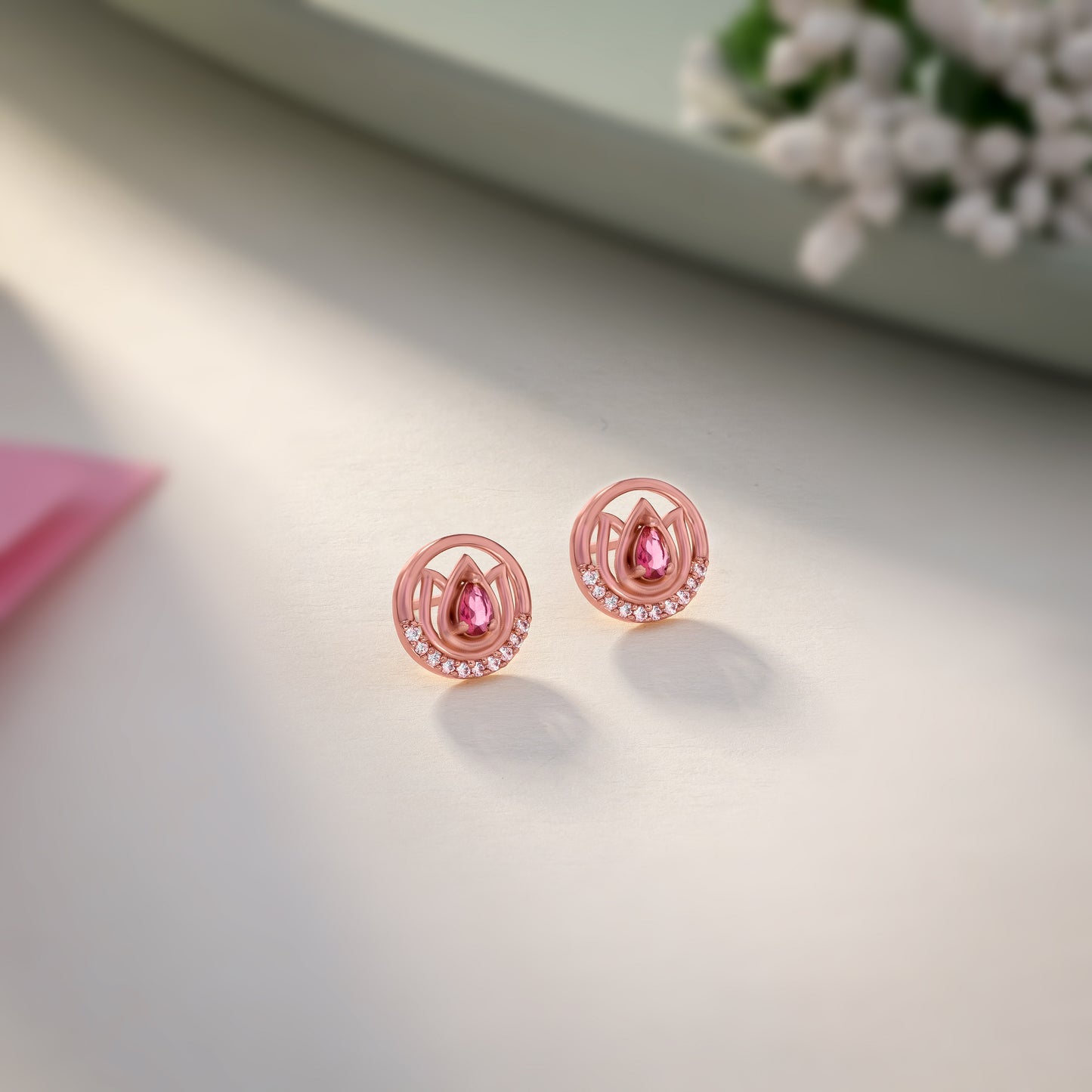 the rose gold earrings with stones