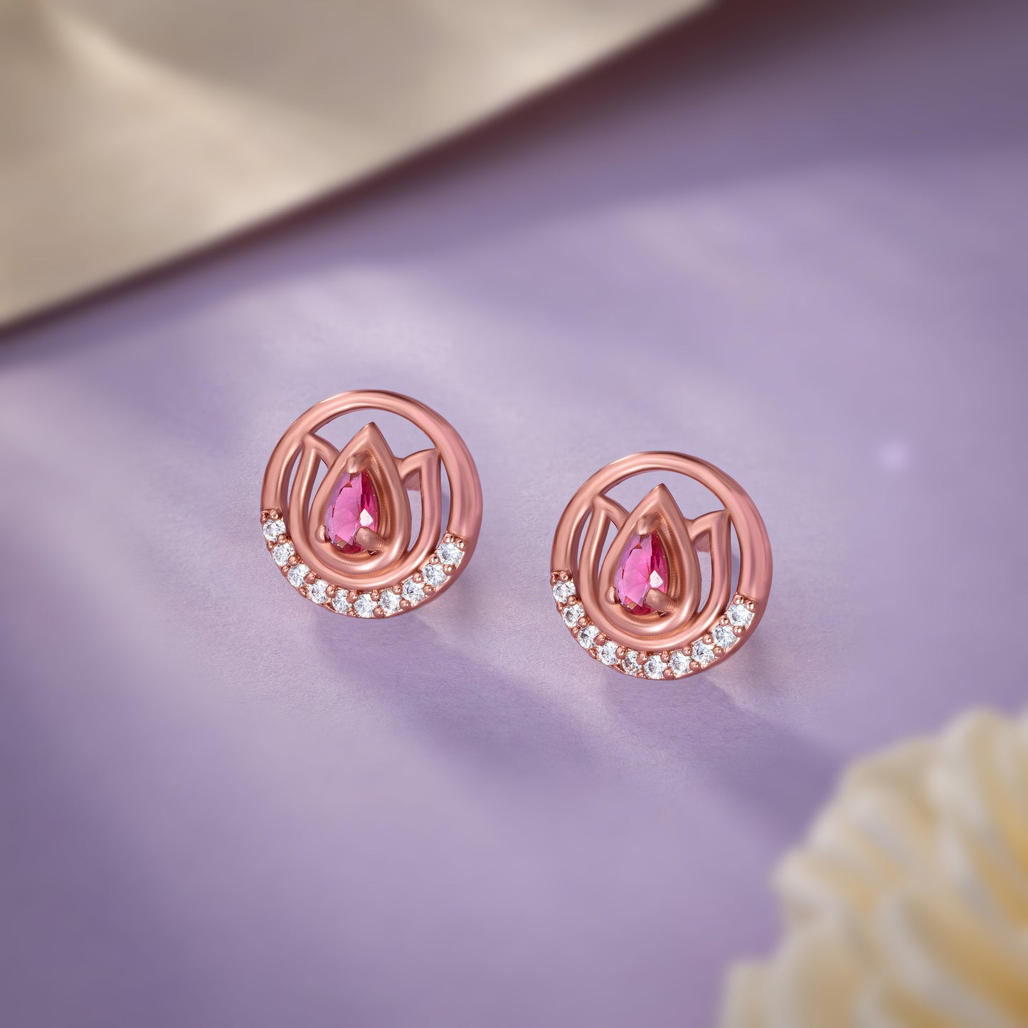 the rose gold earrings with stones